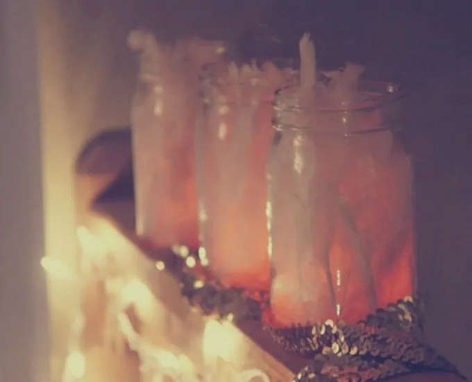 candlelit feather masterpieces